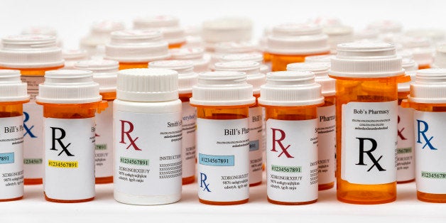 Rx bottles. All names and printing on the labels are fictitious.