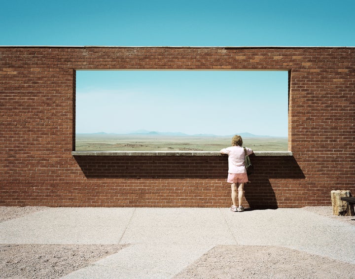 Woman at meteor crater viewpoint