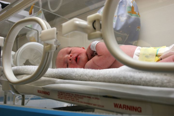 newborn baby inside incubator