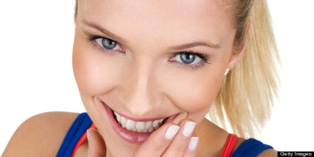 close up of beautiful woman laughing, isolated on white background