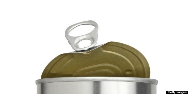 Metal food container with an easy open pull tab top with the lid partially open. Dangerous levels of BPA (Bisphenol A) have been found in some food that is packaged in cans that have a thin plastic lining that contains the chemical.