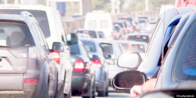 cars line up against a detour...