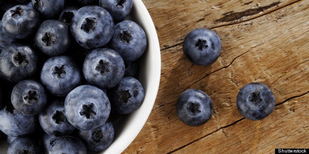 blueberry in white bowl