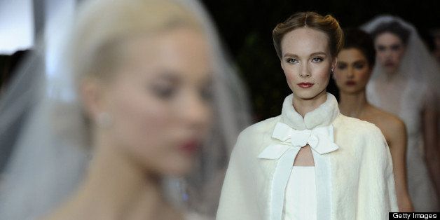 NEW YORK, NY - APRIL 21: A model walks the runway during the Carolina Herrera 2014 Bridal Spring/Summer collection show on April 21, 2013 in New York City. (Photo by Fernanda Calfat/Getty Images)
