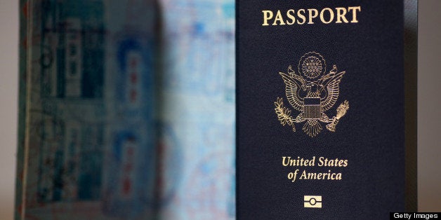 U.S. passports are arranged for a photograph in New York, U.S., on Tuesday, April 23, 2013. A court challenge by federal immigration agents seeking to block President Barack Obama?s deferred-deportation initiative will probably succeed, a judge said. Photographer: Victor J. Blue/Bloomberg via Getty Images