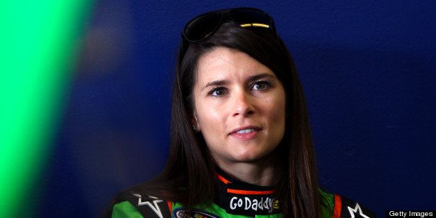 DAYTONA BEACH, FL - FEBRUARY 21: Danica Patrick, driver of the #34 GoDaddy.com Chevrolet, looks on in the garage during practice for the NASCAR Nationwide Series DRIVE4COPD 300 at Daytona International Speedway on February 21, 2013 in Daytona Beach, Florida. (Photo by Jonathan Ferrey/Getty Images)