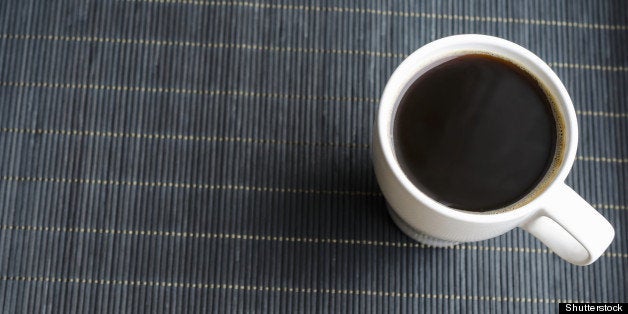 cup of coffee on bamboo napkin