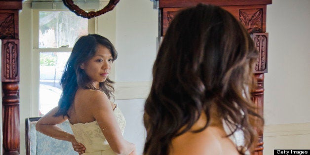 dressmaker's shop, evaluating a wedding dress