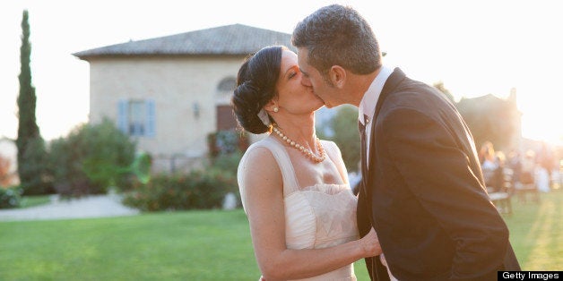 bride and groom kissing