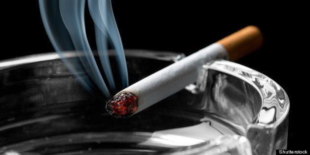 closeup of cigarette on ashtray ...