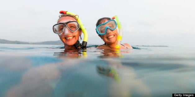 Portrait of two female snorkelers