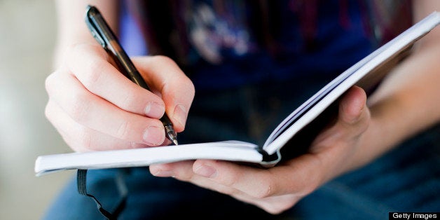 Young woman doing her school work