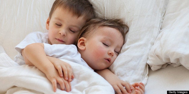 Two boys sleeping, brothers