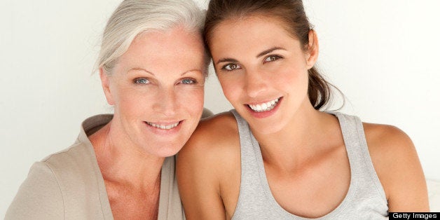 Portrait of a mother and her daughter smiling