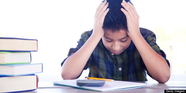 Frustrated student doing his math homework.