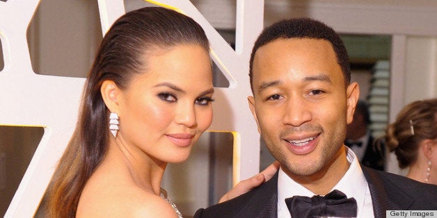 WASHINGTON, DC - APRIL 27: Chrissy Teigen and John Legend attend the TIME/CNN/PEOPLE/FORTUNE Pre-Dinner Cocktail Reception at Washington Hilton on April 27, 2013 in Washington, DC. (Photo by Michael Loccisano/Getty Images for Time, Inc)