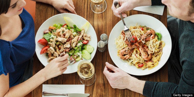 Couple having lunch at cafe