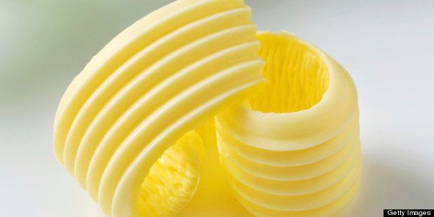 Butter curl isolated on white
