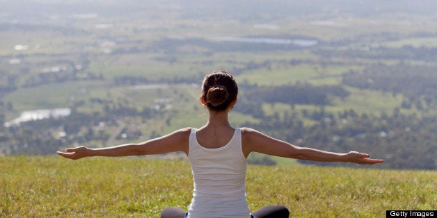 woman practicing yoga outdoor