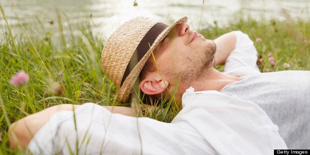 Young man at the Isar river, Munich, Bavaria, Germany