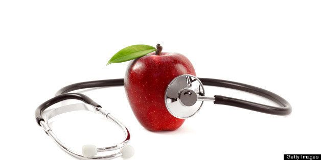 Healthcare concept with apple and stethoscope