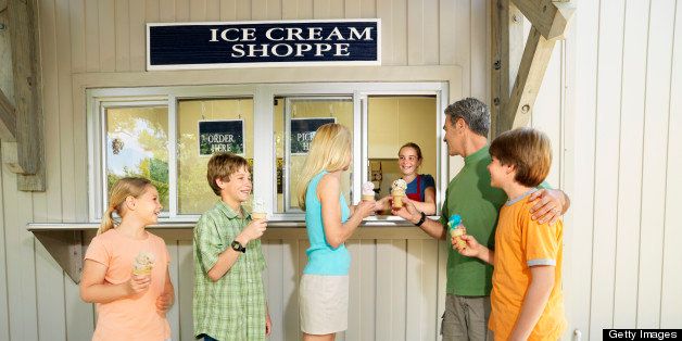 Family Buying Ice Cream Cones at Parlour