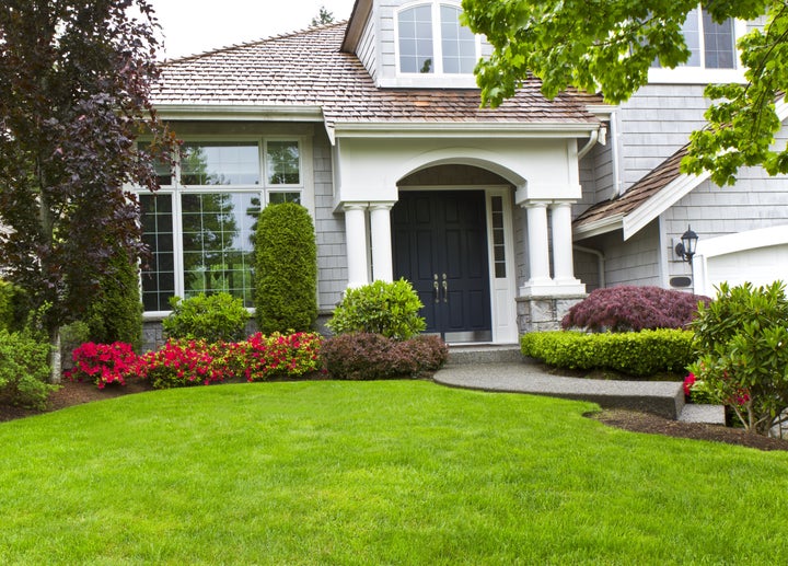 Front yard of modern home during late spring