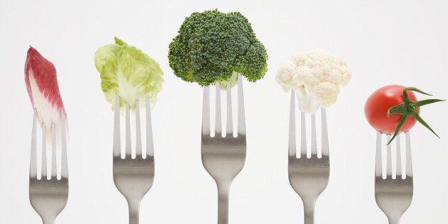 Close up of vegetables on forks