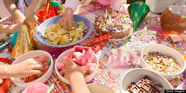 Children eating snacks at birthday party