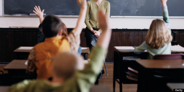 Teacher in Front of a Classroom