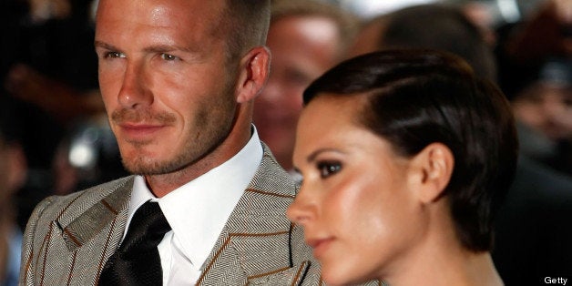 NEW YORK - SEPTEMBER 26: David and Victoria Beckham arrive at the Beckham Signature fragrance launch at Macy's Herald Square