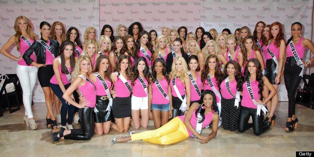 LAS VEGAS, NV - JUNE 08: Miss USA 2012 Nana Meriwether (front) and Miss USA 2013 contestants attend an autograph signing at the Chinese Laundry store at the Fashion Show mall on June 8, 2013 in Las Vegas, Nevada. (Photo by Mindy Small/FilmMagic)