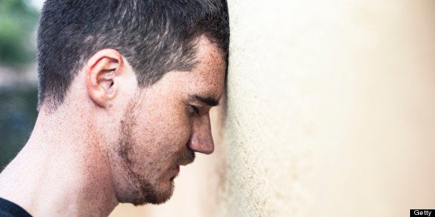 'Lonely man with head against the wall. With copy space. Apulialypse in Italy, 2012.View my lightbox:'