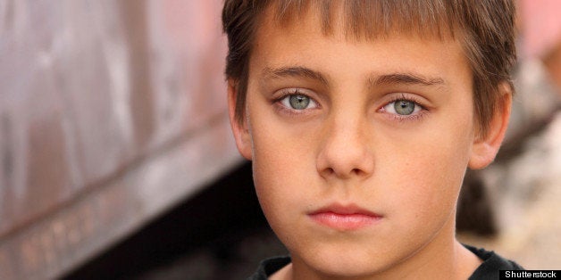 boy with beautiful eyes against ...