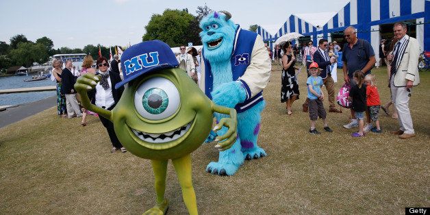 HENLEY-ON-THAMES, ENGLAND - JULY 07: Mike and Scully, characters from the Disney film 'Monsters University', walk through the boat tent area during a promotional stunt for the new film on finals day of the Henley Royal Regatta on July 7, 2013 in Henley-on-Thames, England. In the new fi (Photo by Harry Engels/Getty Images)