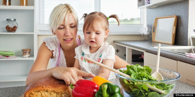 merry young family preparing a...