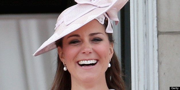LONDON, ENGLAND - JUNE 15: Catherine, Duchess of Cambridge laughs on the balcony of Buckingham Palace during the annual Trooping the Colour Ceremony on June 15, 2013 in London, England. Today's ceremony which marks the Queens official birthday will not be attended by Prince Philip the Duke of Edinburgh as he recuperates from abdominal surgery and will also be The Duchess of Cambridge's last public engagement before her baby is due to be born next month. (Photo by Chris Jackson/Getty Images)