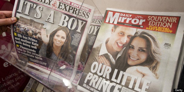 Newspaper front pages report news of the birth of a new royal baby in London on July 23, 2013. International messages of congratulations poured in for the Duke and Duchess of Cambridge following the birth of the third in line to the throne, celebrated by gunfire salutes across London. AFP PHOTO / WILL OLIVER (Photo credit should read WILL OLIVER/AFP/Getty Images)