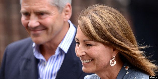 LONDON, ENGLAND - JULY 23: Carole and Michael Middleton depart after visiting The Duke and Duchess of Cambridge and the new baby at St Mary's hospital on July 23, 2013 in London, England. The Duchess of Cambridge yesterday gave birth to a boy at 16.24 BST and weighing 8lb 6oz, with Prince William at her side. The baby, as yet unnamed, is third in line to the throne and becomes the Prince of Cambridge.ￂﾠ (Photo by Karwai Tang/WireImage)
