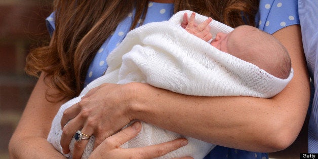 LONDON, ENGLAND - JULY 23: Catherine, Duchess of Cambridge carrying her newborn baby son departs the Lindo Wing of St Mary's Hospital with Prince William, Duke of Cambridge on July 23, 2013 in London, England. Catherine, Duchess of Cambridge yesterday gave birth to a boy at 16.24 BST and weighing 8lb 6oz, with Prince William, Duke of Cambridge at her side. The baby, as yet unnamed, is third in line to the throne and becomes the Prince of Cambridge. (Photo by Karwai Tang/WireImage)