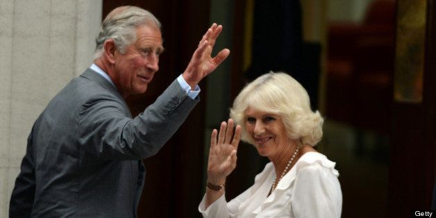 LONDON, UNITED KINGDOM - JULY 23: Prince Charles, Prince of Wales and Camilla, Duchess of Cornwall visit the Duke and Duchess of Cambridge and their newborn baby son at the Lindo Wing, St Mary's Hospital on July 23, 2013 in London, England. Catherine, Duchess of Cambridge yesterday gave birth to a boy at 16.24 BST and weighing 8lb 6oz, with Prince William, Duke of Cambridge at her side. The baby, as yet unnamed, is third in line to the throne and becomes the Prince of Cambridge. (Photo by Anwar Hussein/WireImage)