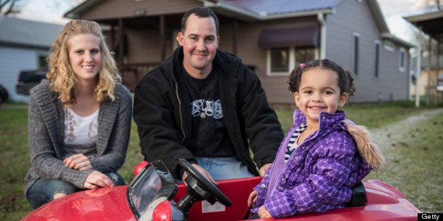 NOWATA, OK - April 11: Veronica pictured with her biological father Dusten Brown and his wife Robin. (Photo by Jeremy Charles/For the Washington Post)