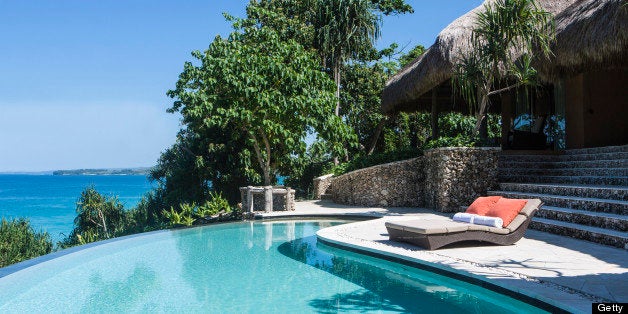 SUMBA, INDONESIA - APRIL 14: The pool and sun lounge area at the Kasambi Family Villa at Nihiwatu Resort, Western Sumba on April 14, 2013. Sumba is a remote island in Eastern Indonesia, part of the Lesser Sunda Islands group based in the province of East Nusa Tenggara. (Photo by Callaghan Walsh/Getty Images)