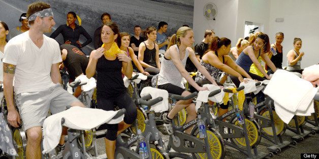 WEST HOLLYWOOD, CA - JANUARY 30: Cyclists attend Glamour Magazine's SoulCycle ride to benefit Milk + Bookies instructed by Max Greenfield at SoulCycle on January 30, 2013 in West Hollywood, California. (Photo by Michael Buckner/Getty Images for Glamour)