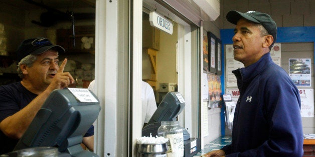 OAK BLUFFS, MA - AUGUST 13: U.S. President Barack Obama Places an order at Nancy's Restaurant August 13, 2013 in Oak Bluffs, Massachusetts. President Obama and his family are spending the week on the island for their summer vacation. (Photo by Matthew Healey-Pool/Getty Images)