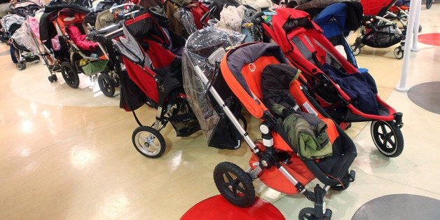 NEW YORK - APRIL 22: Strollers parked the launch of 'Sammy and Sue Go Green Too!' at Kidville on April 22, 2009 in New York City. (Photo by Roger Kisby/Getty Images)