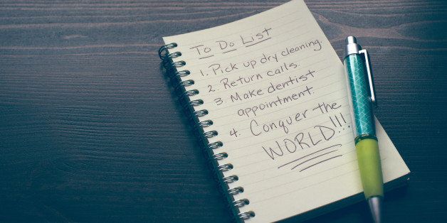 A pen and notebook with a humorous to do list.