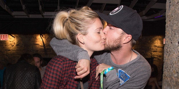 CHICAGO, IL - AUGUST 03: Lauren Parsekian and Aaron Paul attend the Lollapalooza 2013 after party at The Underground on August 3, 2013 in Chicago, Illinois. (Photo by Daniel Boczarski/Getty Images)