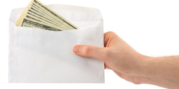 hand and money in envelope...