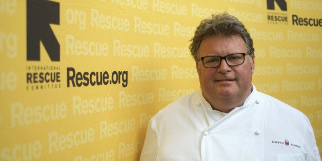 NEW YORK, NY - JULY 24: Chef David Burke poses for a photo at the International Rescue Committee's Third Annual GenR Summer Party at the Garden by David Burke at The James on July 24, 2013 in New York City. (Photo by Neilson Barnard/Getty Images for International Rescue Committee)